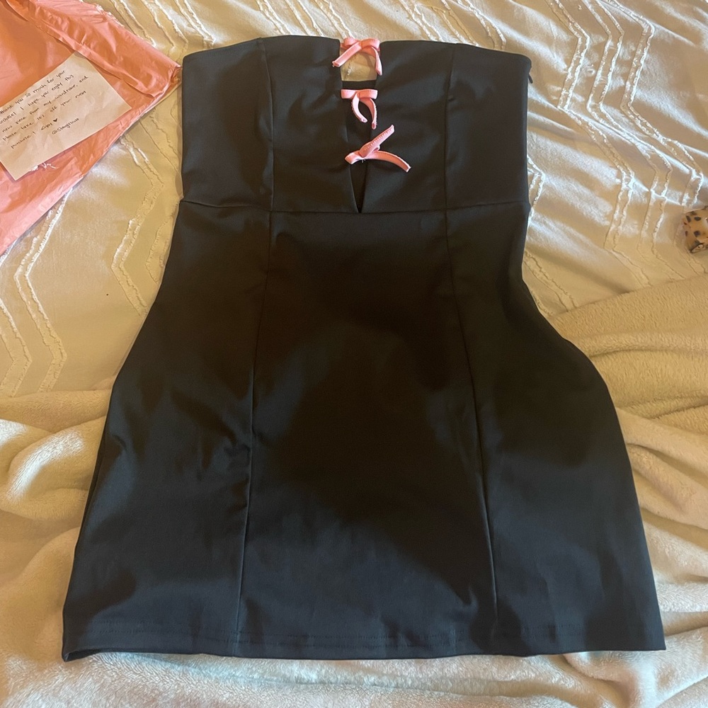 Cute black mini dress with pink bows